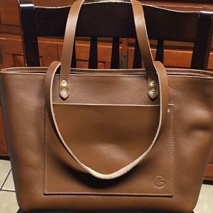 Raw leather structured tote bag